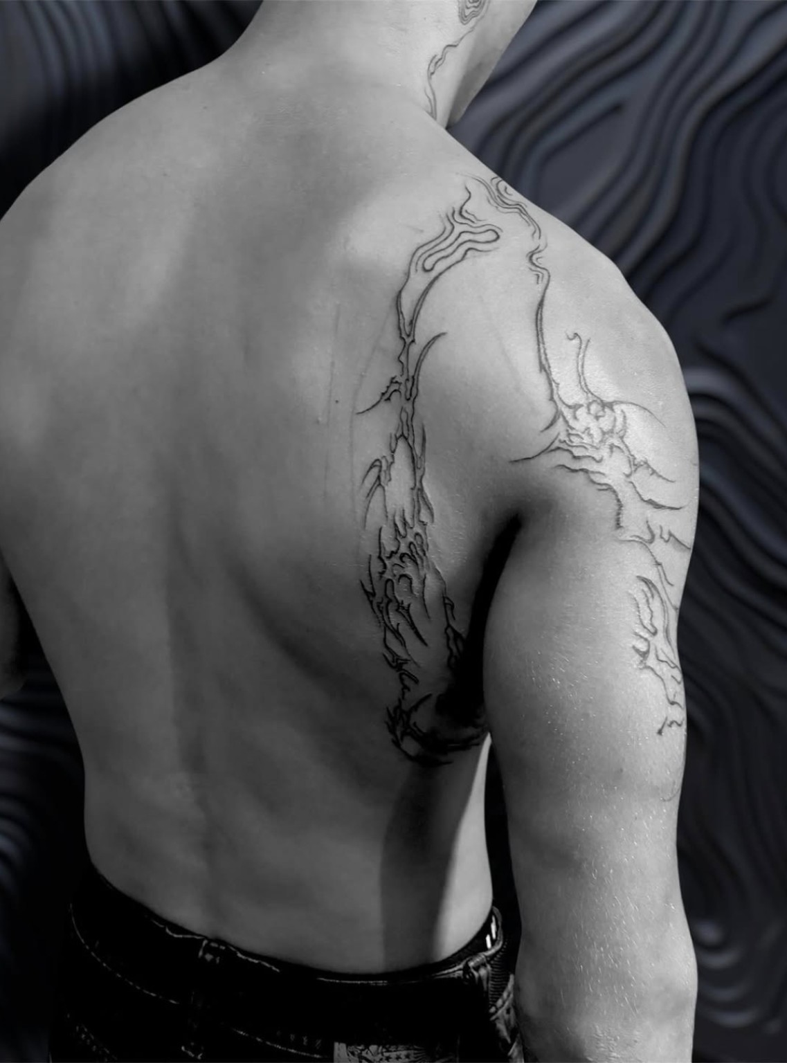 Tatouage réalisé par Smik